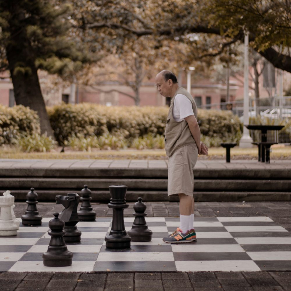 Man thinking on a chessboard